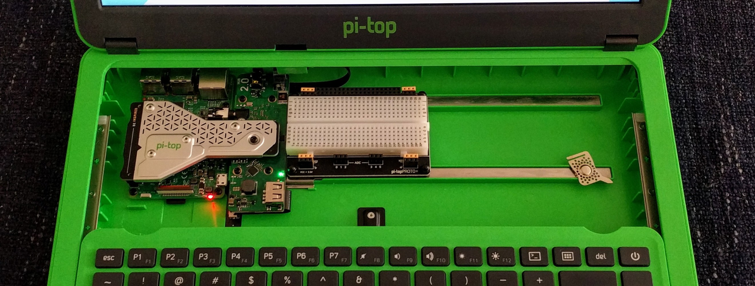 A picture of a Raspberry Pi computer inside a PiTop3 laptop